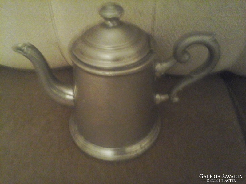 Antique pewter jug with spout