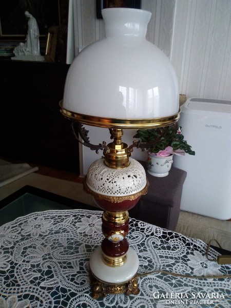 Old electric table lamp with burgundy porcelain body with white openwork pattern, copper fitting.