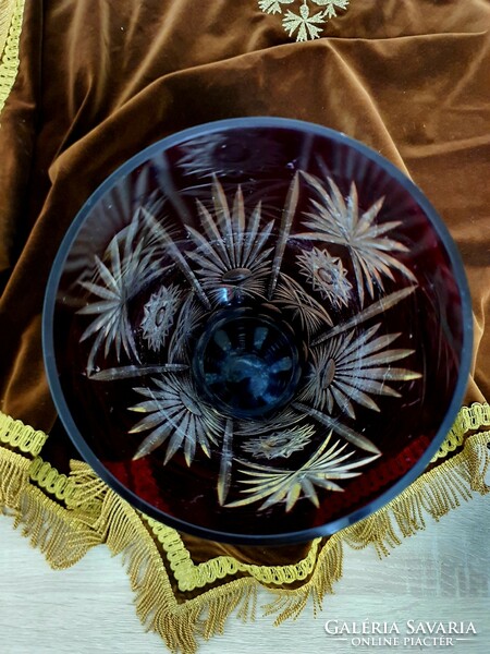 Ruby-burgundy polished crystal vase.