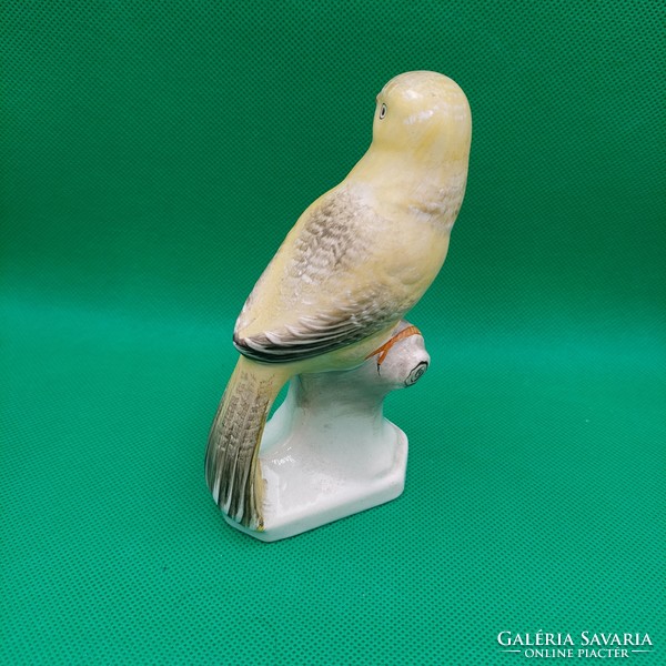 Applied art ceramic yellow thrush figure
