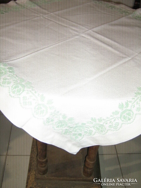 Beautiful tiny cross-stitched pale green floral white tablecloth