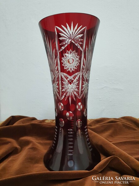 Ruby-burgundy polished crystal vase.