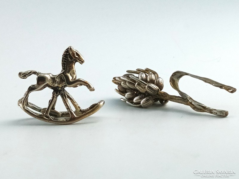 Silver ornaments, rocking horse, wheat stalk