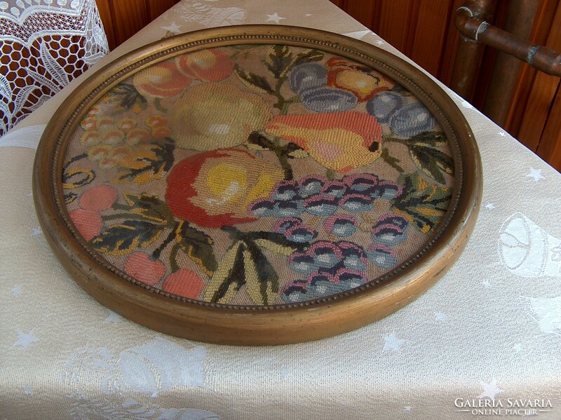 Tapestry depicting fruits in an old round frame, flawless.