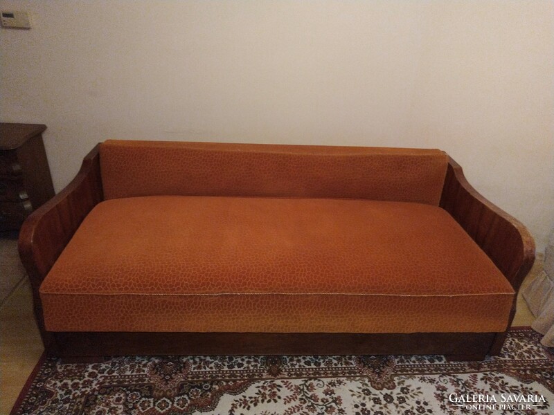 Classic, old-style solid wood bed with linen holder, sofa that can be opened into a bed