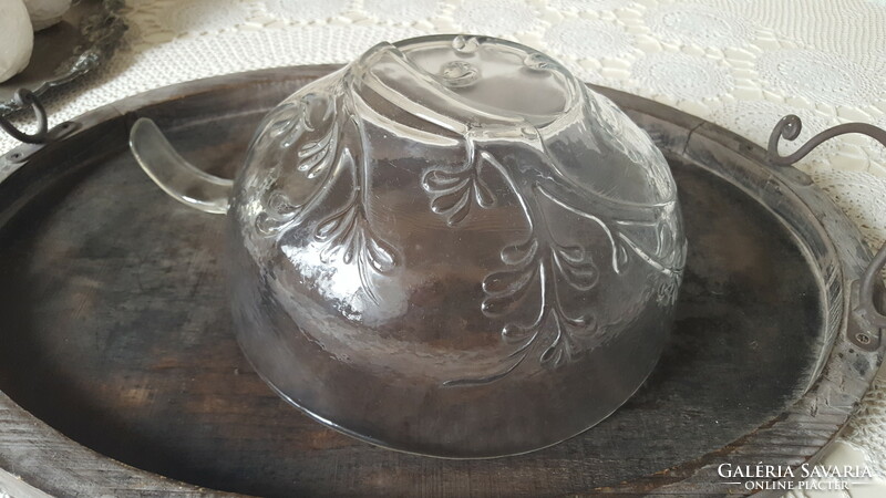Thick glass bowl with a handle with relief patterns