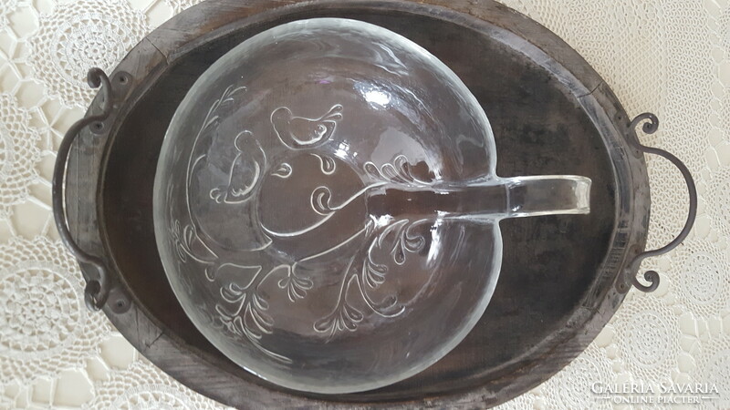 Thick glass bowl with a handle with relief patterns