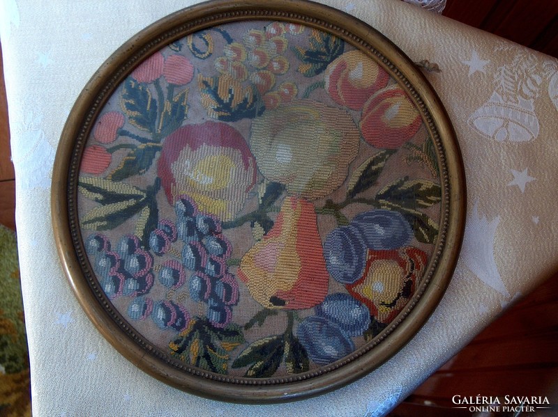 Tapestry depicting fruits in an old round frame, flawless.