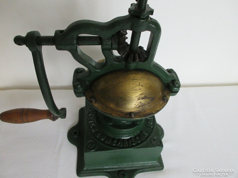 Antique, marked, large coffee grinder from a coffee shop. Negotiable!