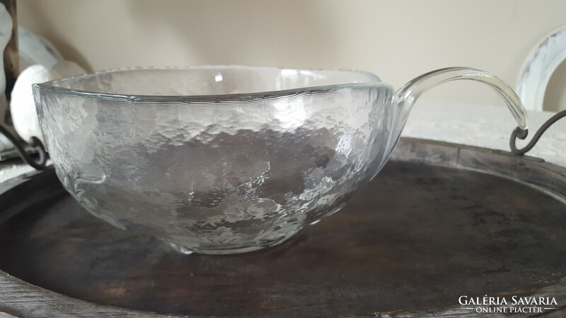 Thick glass bowl with a handle with relief patterns