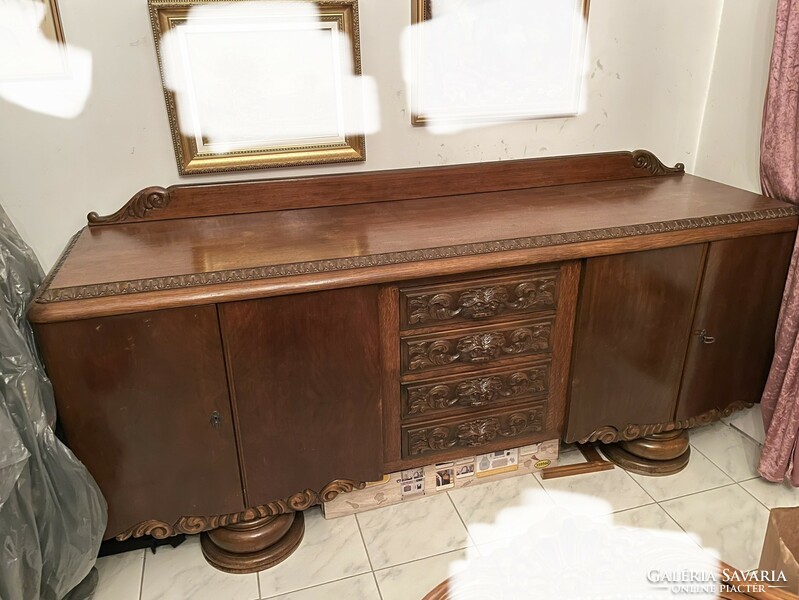 Huge solid carved wooden chest of drawers / sideboard