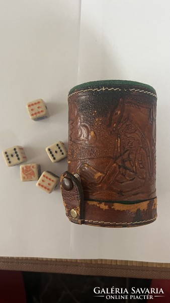For sale is an old Mexican (Mayan) leather dice throwing cup with dice.