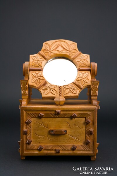 Wooden, hand-carved, mirrored, small box with drawers, made in 1976.