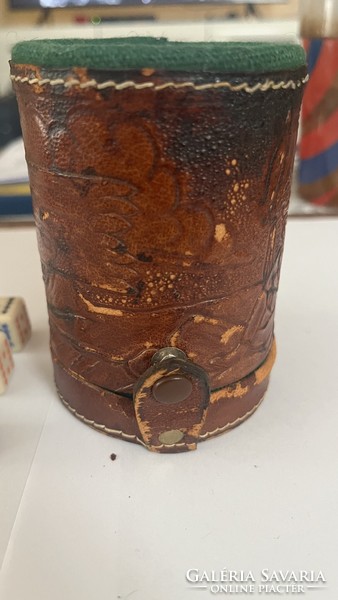 For sale is an old Mexican (Mayan) leather dice throwing cup with dice.