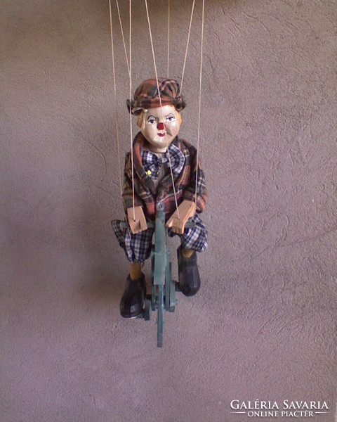 Cyclist clown puppet figure