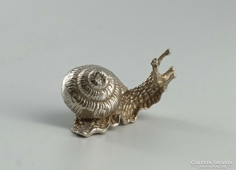 Silver figure, snail