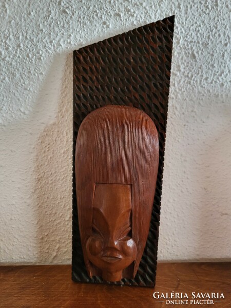 Relief wood carving, wall picture_female head