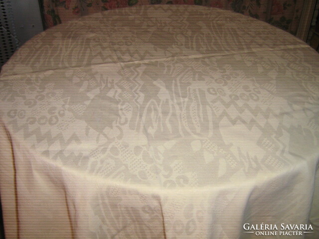 Damask tablecloth with beautiful elegant buttery yellow sliding pattern