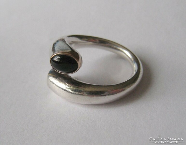 Solid silver ring with onyx stone, gold-plated part, design jewelry