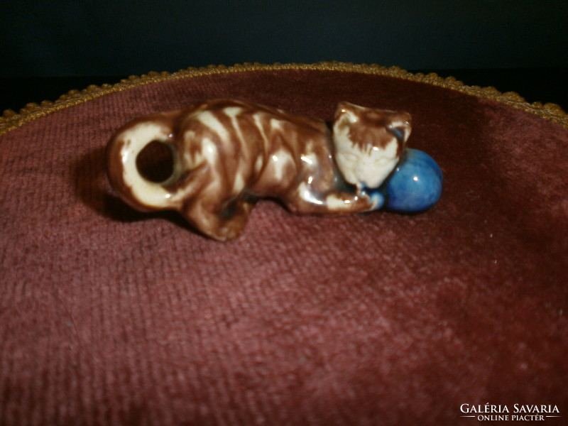 Ceramic kitten with a ball