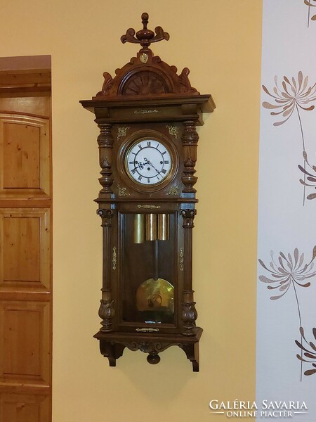 Three heavy copper veined wall clocks with three German quarter strikes