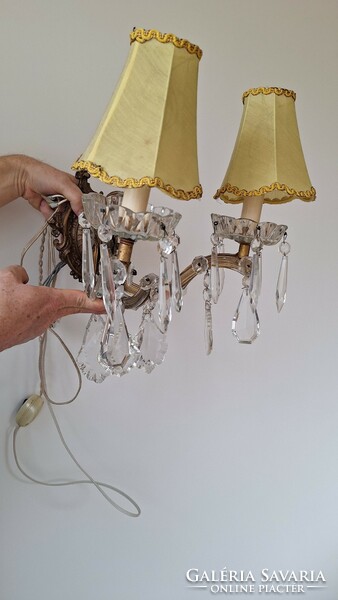 Two-pronged crystal wall arm with polished crystal pendants