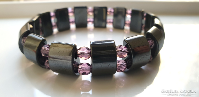 Magnetite bracelet with purple polished glass beads.