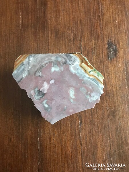 A piece of marble rock. In case someone collects it. Size: 15x12 cm