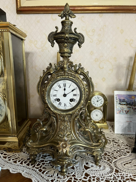Antique baroque-style copper chiseled, half-baked mantel clock