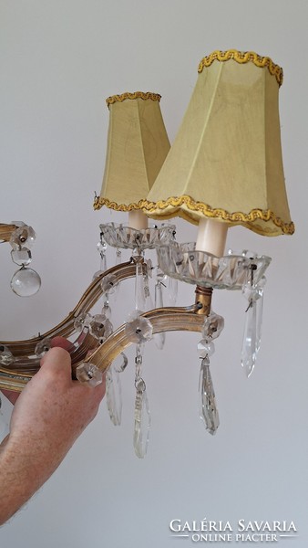 Two-pronged crystal wall arm with polished crystal pendants