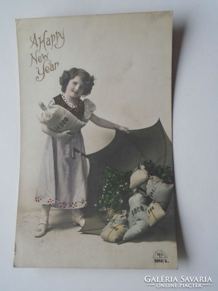 D201715 little girl with many money bags colored New Year's photo sheet 1910