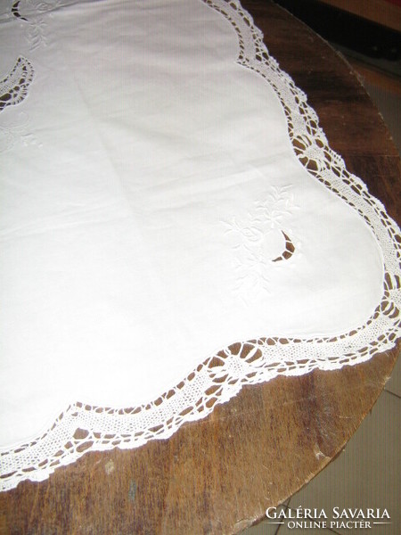 Beautiful white filigree needlework tablecloth