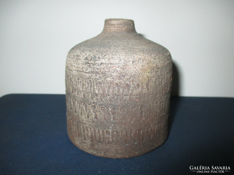 Small, marked ceramic vase