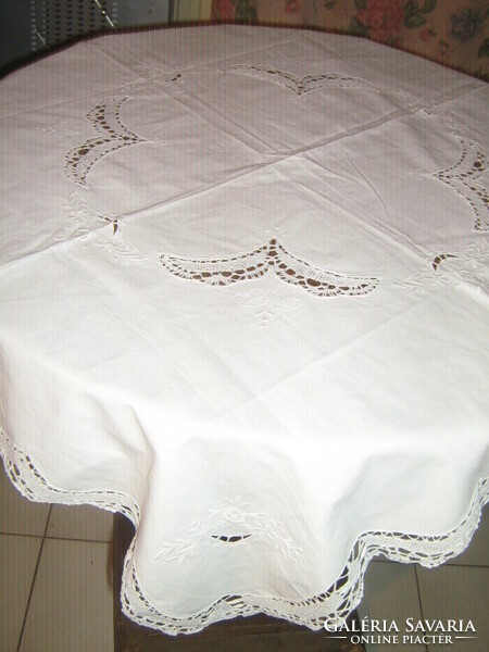 Beautiful white filigree needlework tablecloth