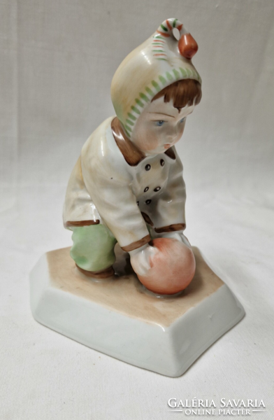 Porcelain figurine of Zsolnay ball boy or child designed by András Sinkó in perfect condition 14 cm.