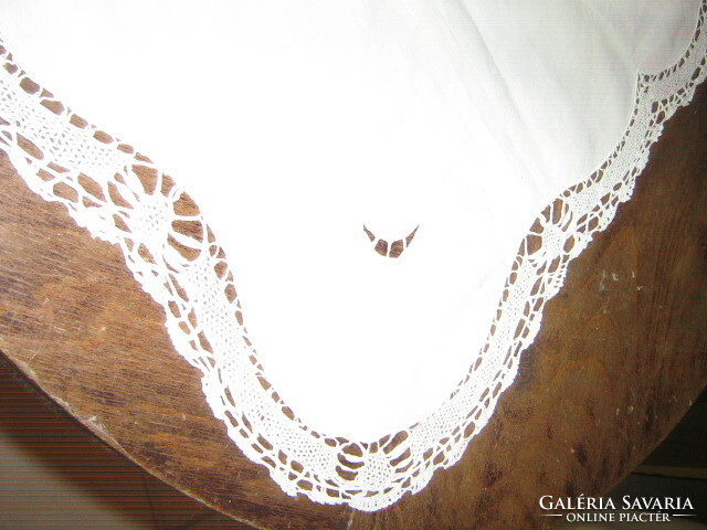 Beautiful white filigree needlework tablecloth