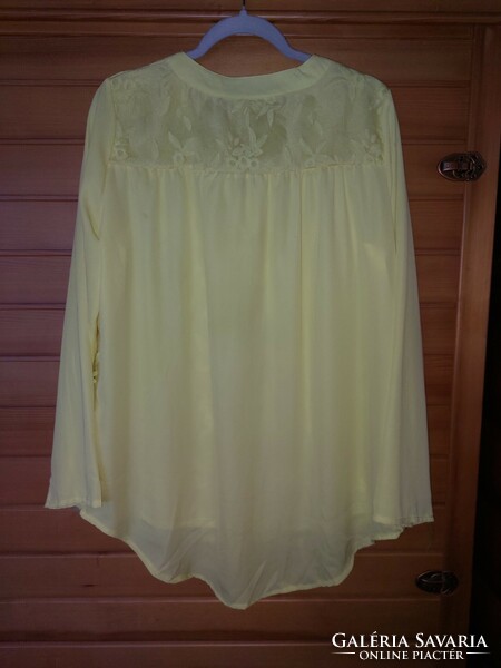 Bright lemon yellow, embroidered, longer back casual top
