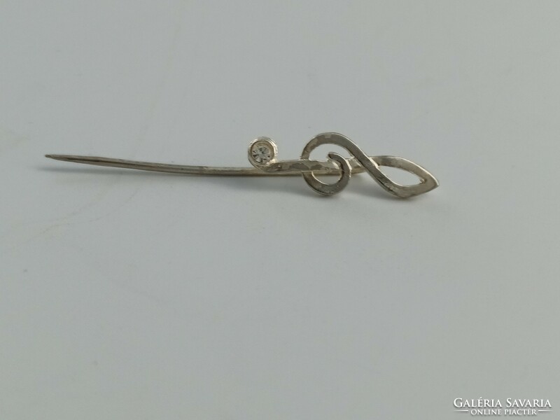 Silver pin, treble clef