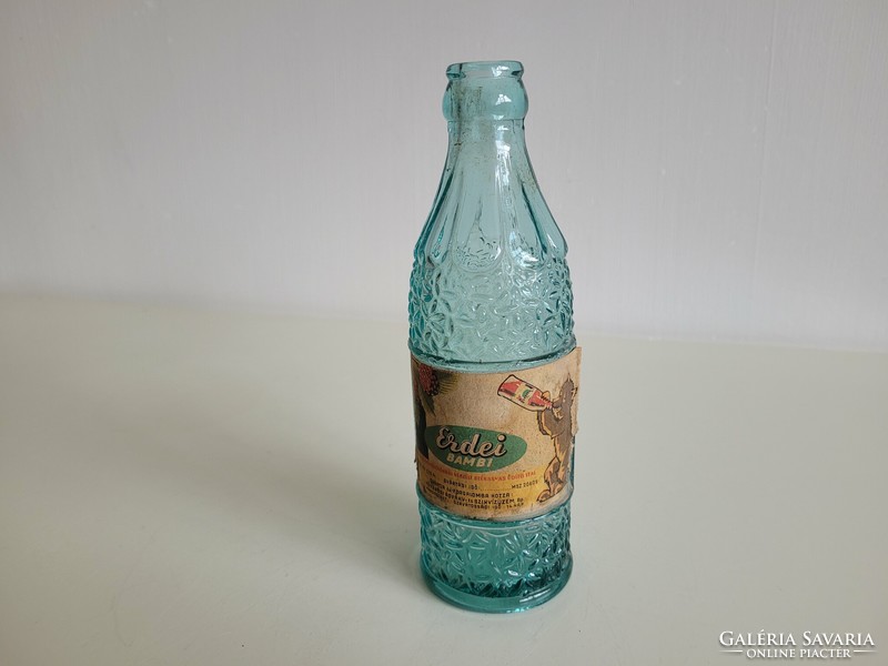 Old blue soda bottle forest bambi mid century retro carbonated drink