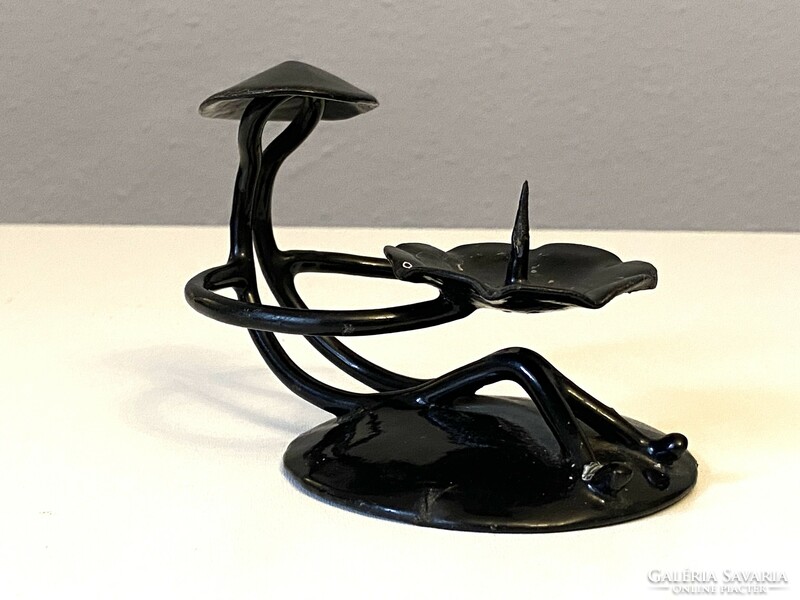Seated vietnamese man retro black color metal candle holder