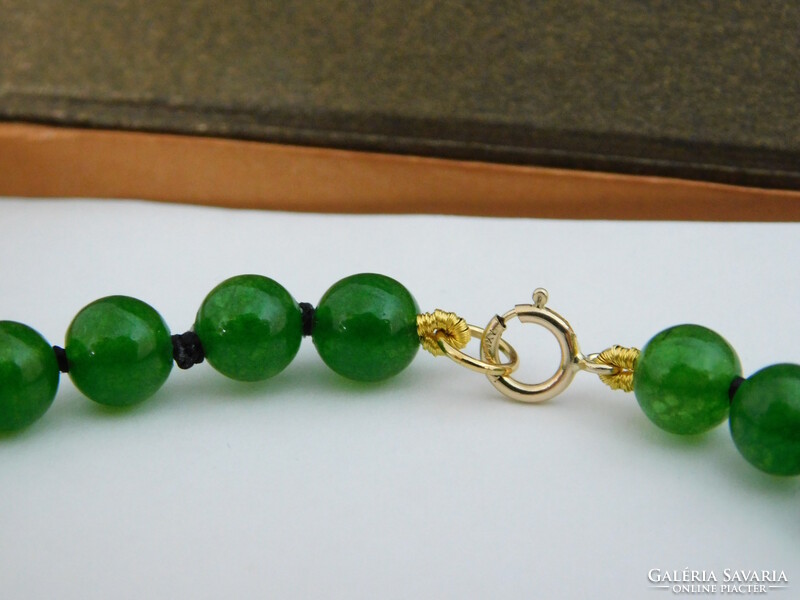 14k gold jade bracelet with beads and 14k gold balls