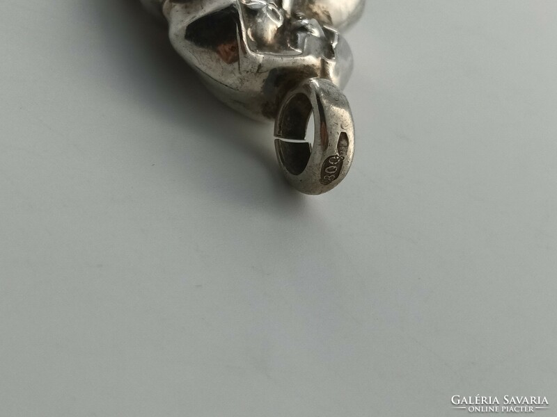 Silver figure, bell, dog, key chain