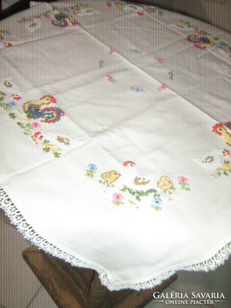 Beautiful hand embroidered Easter lacy-edged cross-stitch tablecloth
