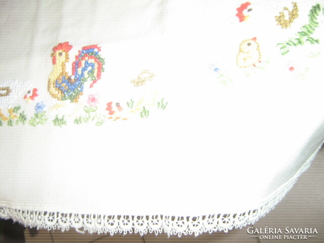 Beautiful hand embroidered Easter lacy-edged cross-stitch tablecloth