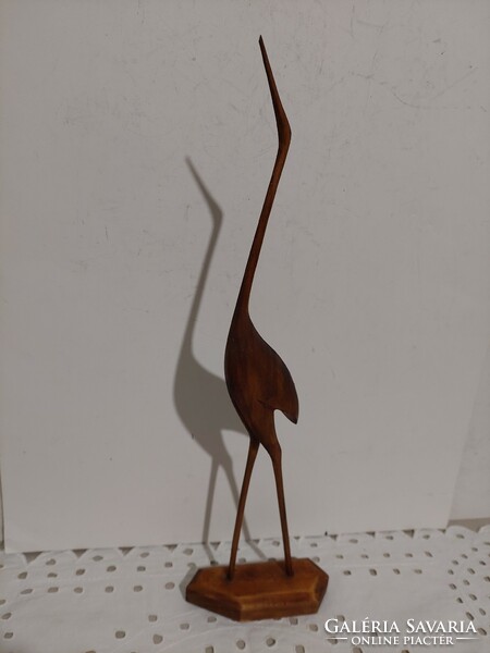 Wood sculpture of a stork