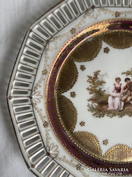 Beautiful antique scene richly gilded decorative plate with openwork edge.