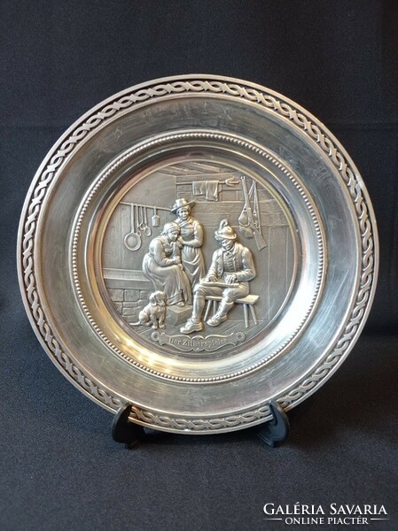 Pewter decorative wall plate with the title of the zither game