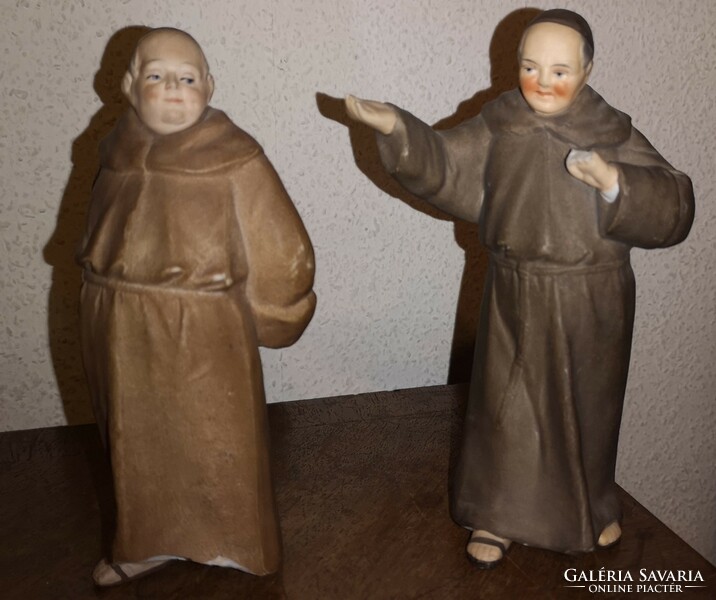 Two antique porcelain monks