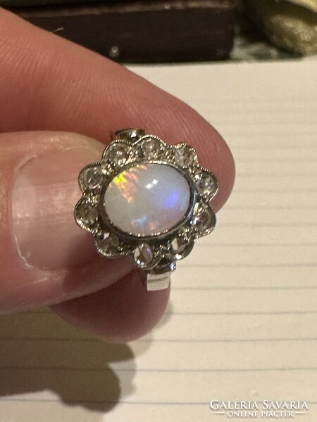 Very nice antique 14 kr gold ring decorated with beautiful opals and diamonds for sale! Price: 108,000.-