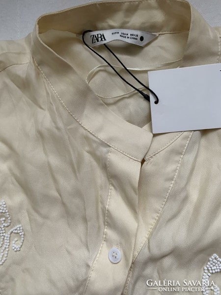 Zara blouse with new label, size M
